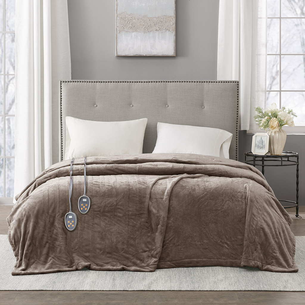 Mink-toned Beautyrest heated blanket on a staged bed with two wired controls visible; image shared across Mink sizes