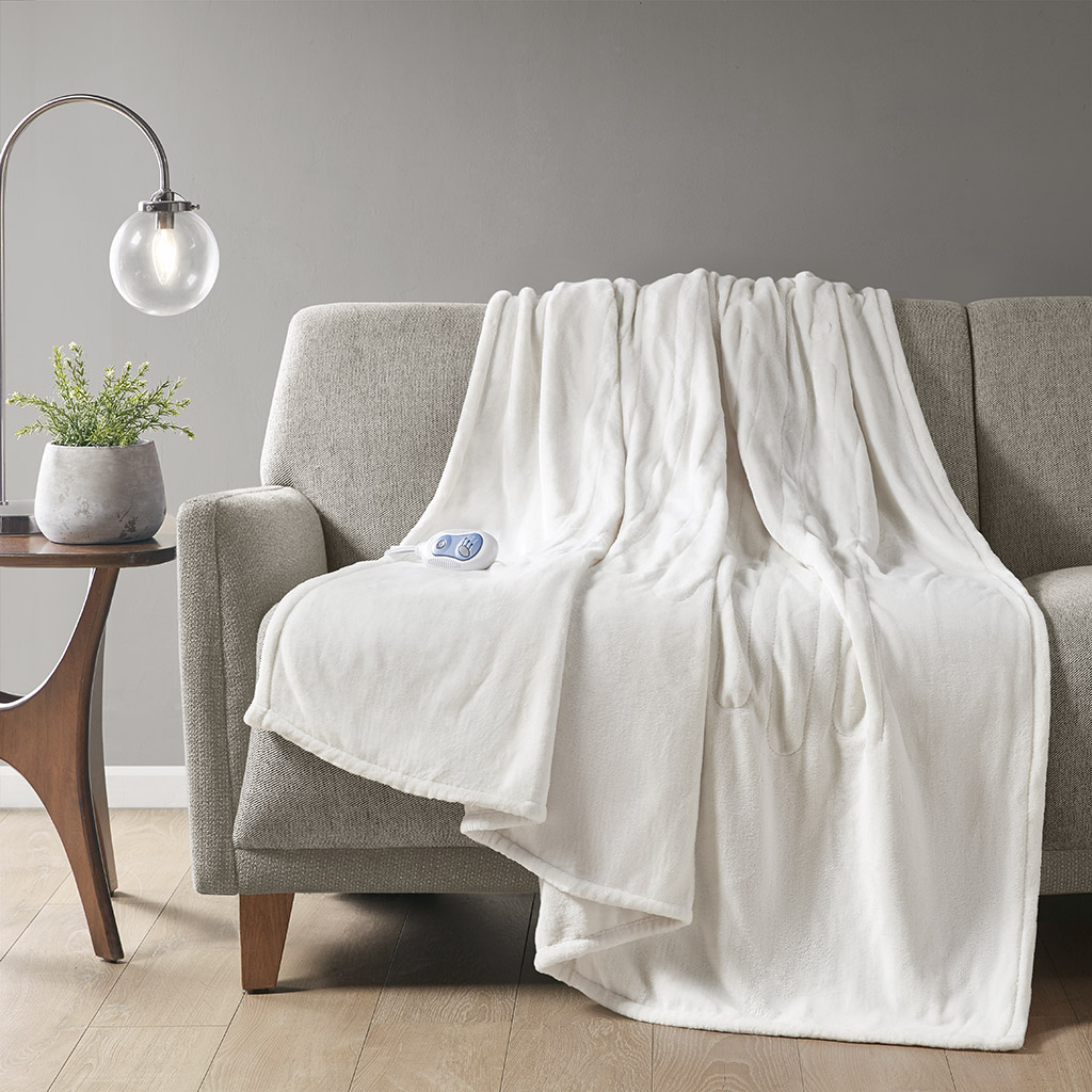 Ivory-looking Beautyrest BR54-0531 plush heated throw and one wired controller