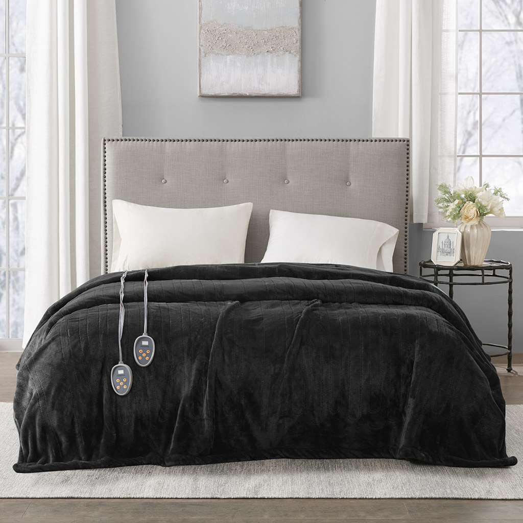 Black-looking Beautyrest plush heated blanket spread across a bed, with two wired controller handsets in the exact Olliix item image for BR54-0910