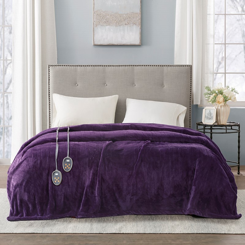 Purple-looking Beautyrest plush blanket with two wired handsets in the image associated by Olliix with BR54-1935
