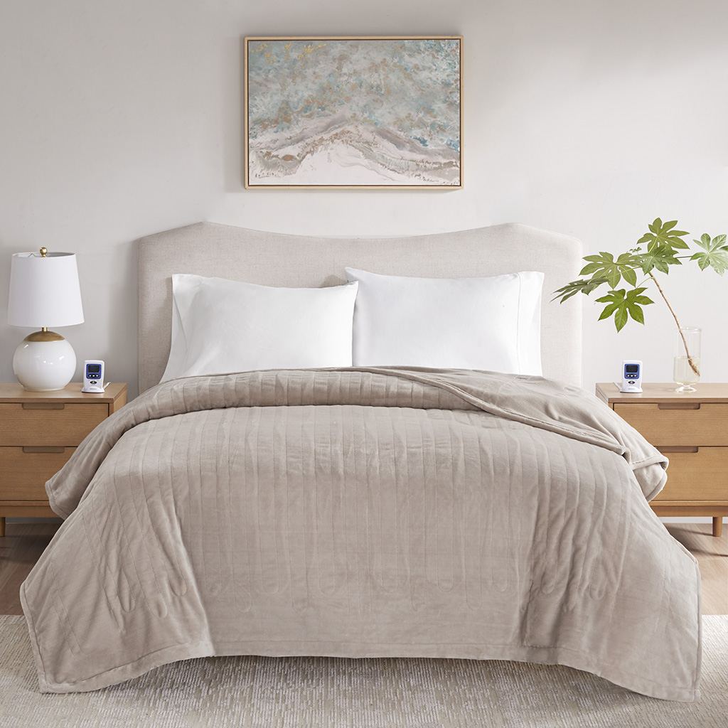 Taupe Beautyrest BR54-4130 Queen Wi-Fi Microplush heated blanket on a bed, with two separate hand controls visible