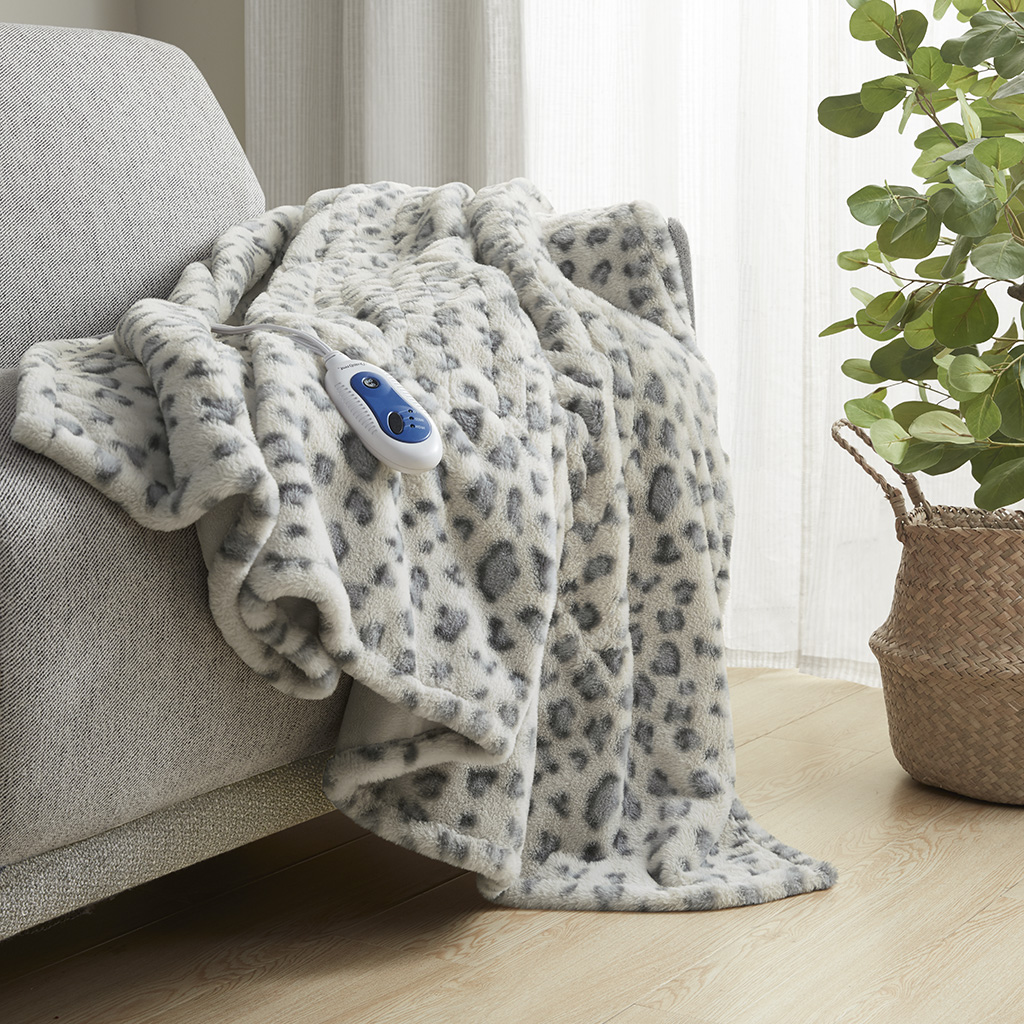 Olliix image associated with BR54-4182: Grey-leopard print throw with one handset visible; the image alone does not establish package contents