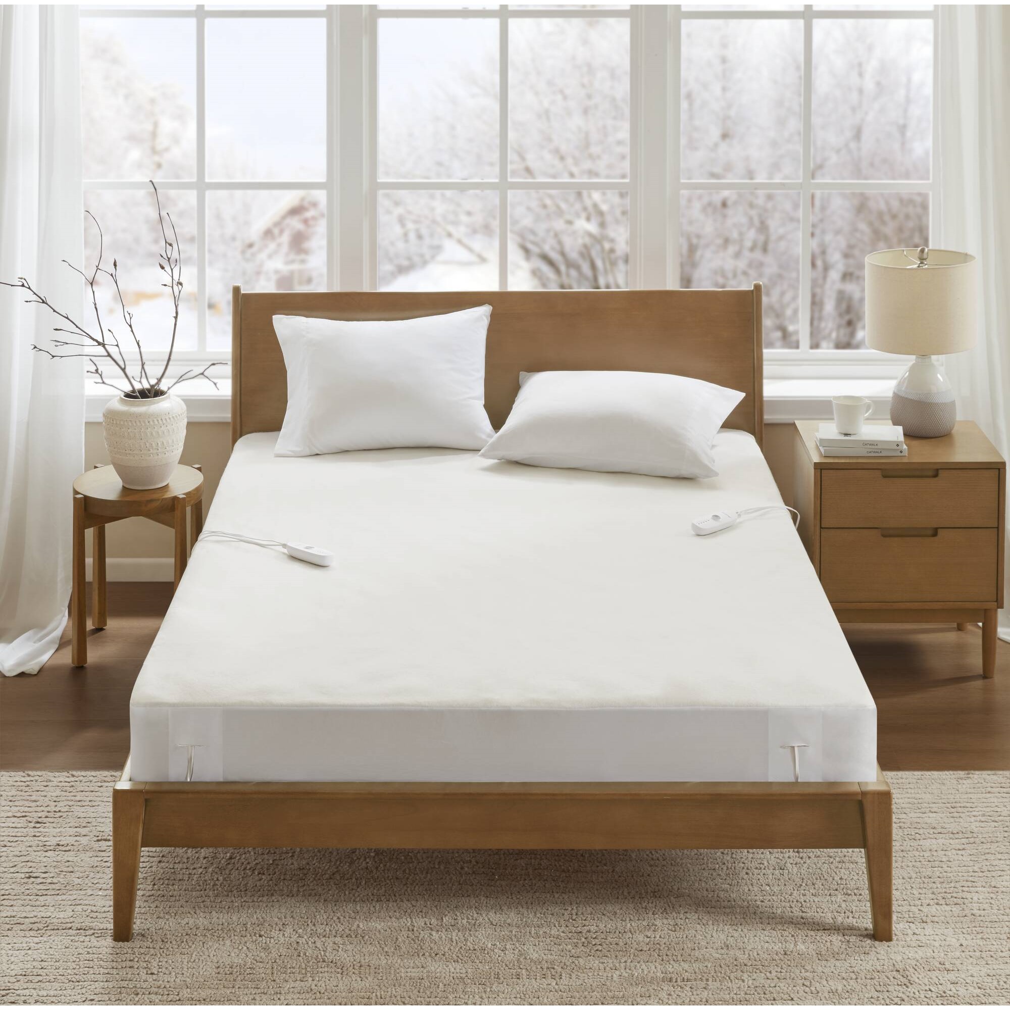 Official Olliix lifestyle image linked from Beautyrest BR55-5287 King Nonwoven Heated Mattress Pad record