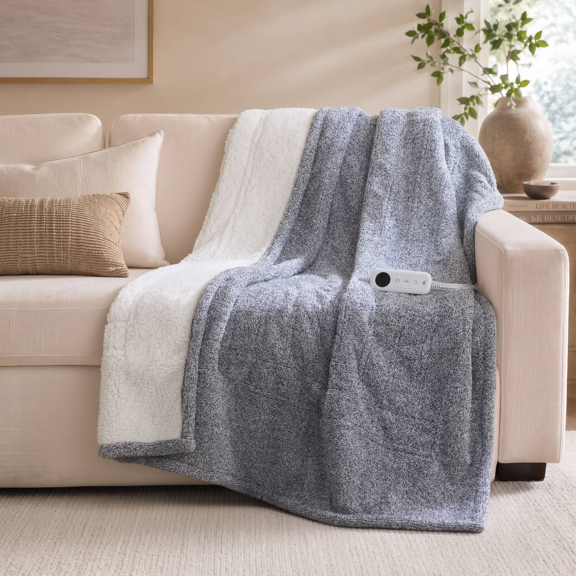 Serta ST54-4796 Marled Blue 50 × 60-inch heated throw, manufacturer reference image