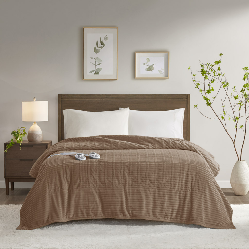 Brown Serta Corded Plush electric blanket on a styled bed; the manufacturer image is a shared family view, not a size-specific controller-count photograph
