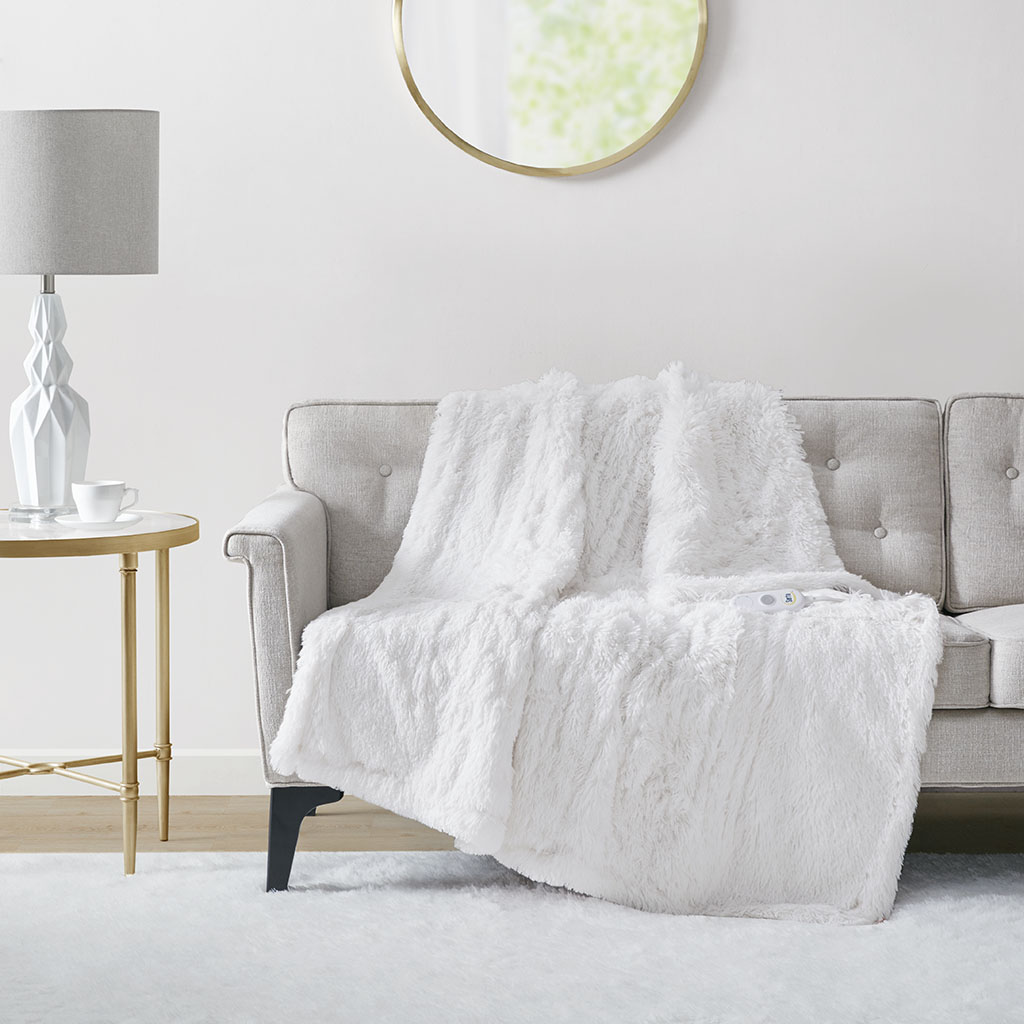 Official Serta Malea ST54-0151 White throw, visibly shaggy and shown with one controller