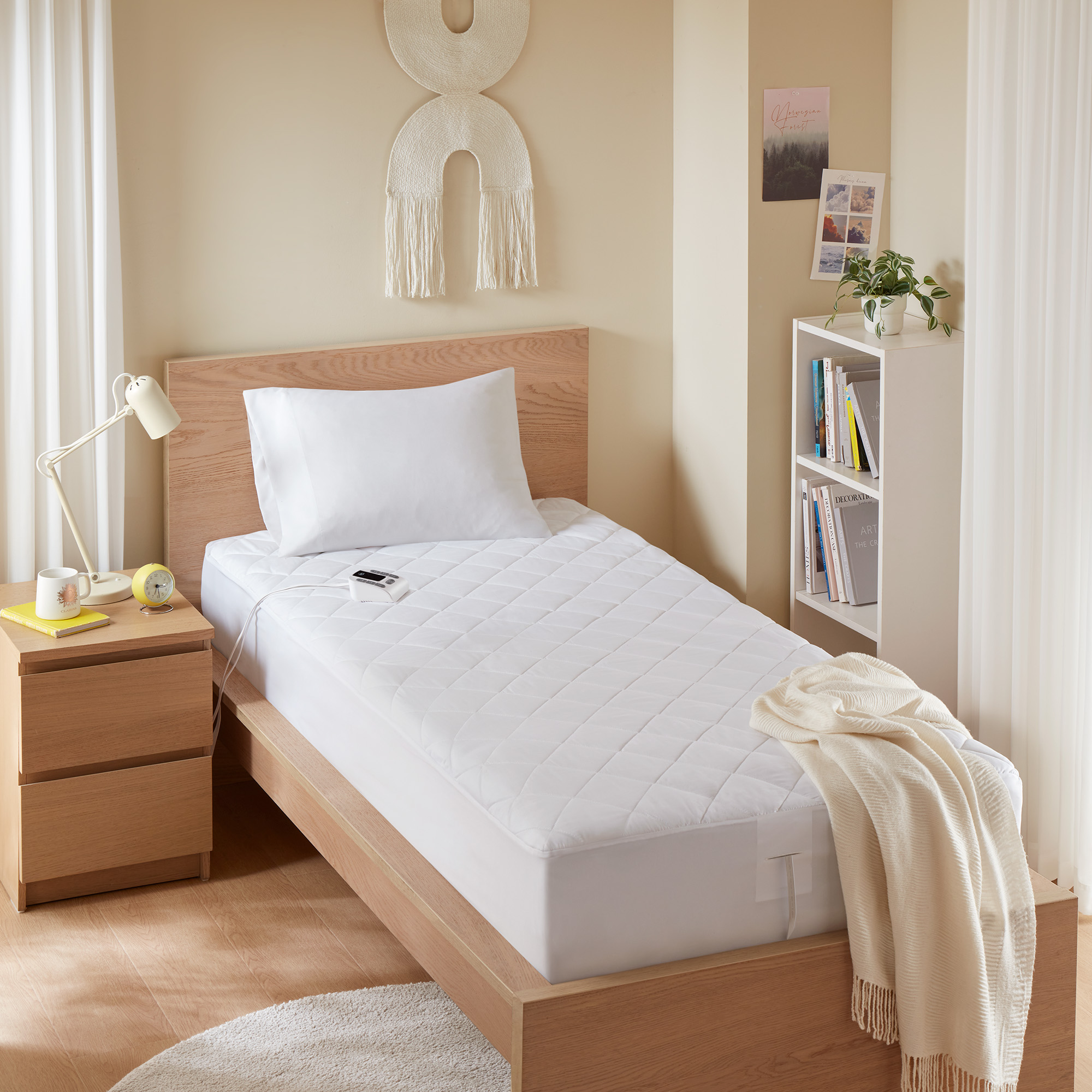 Serta manufacturer image tied to ST55-4530 Twin and ST55-4531 Twin XL, showing a white fitted heated pad with one visible handset