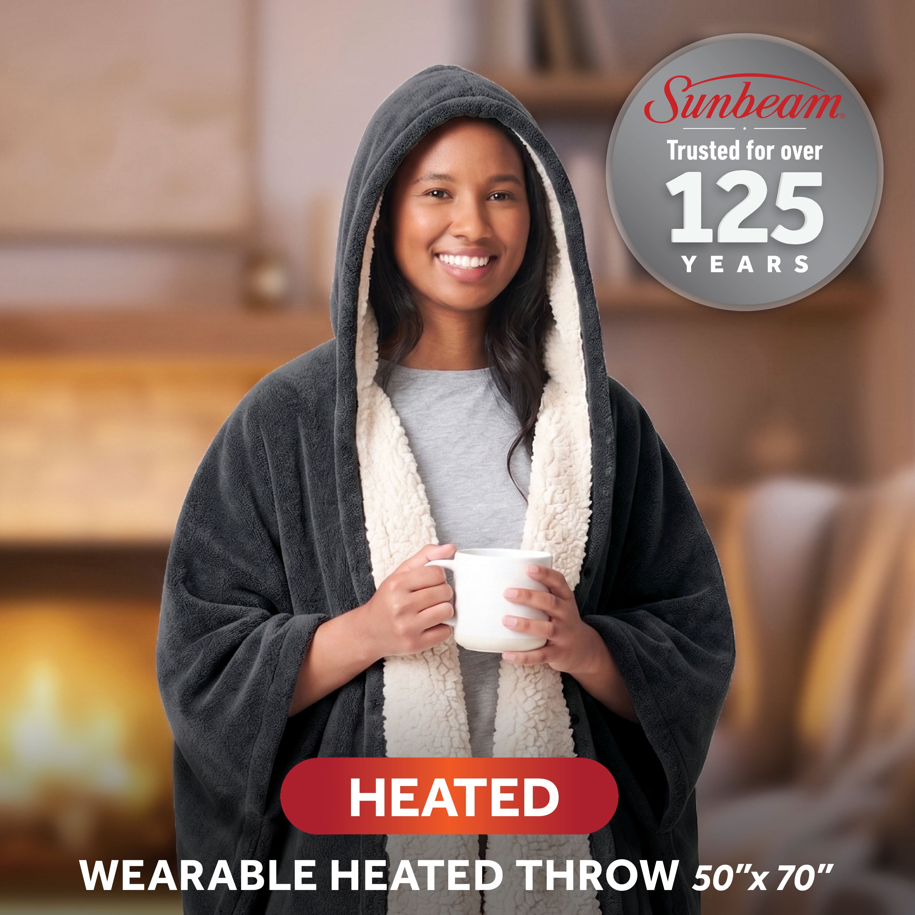 Sunbeam gray hooded wearable heated throw on the exact SKU 14793 product page, with page graphic labeling it 50 × 70 inches