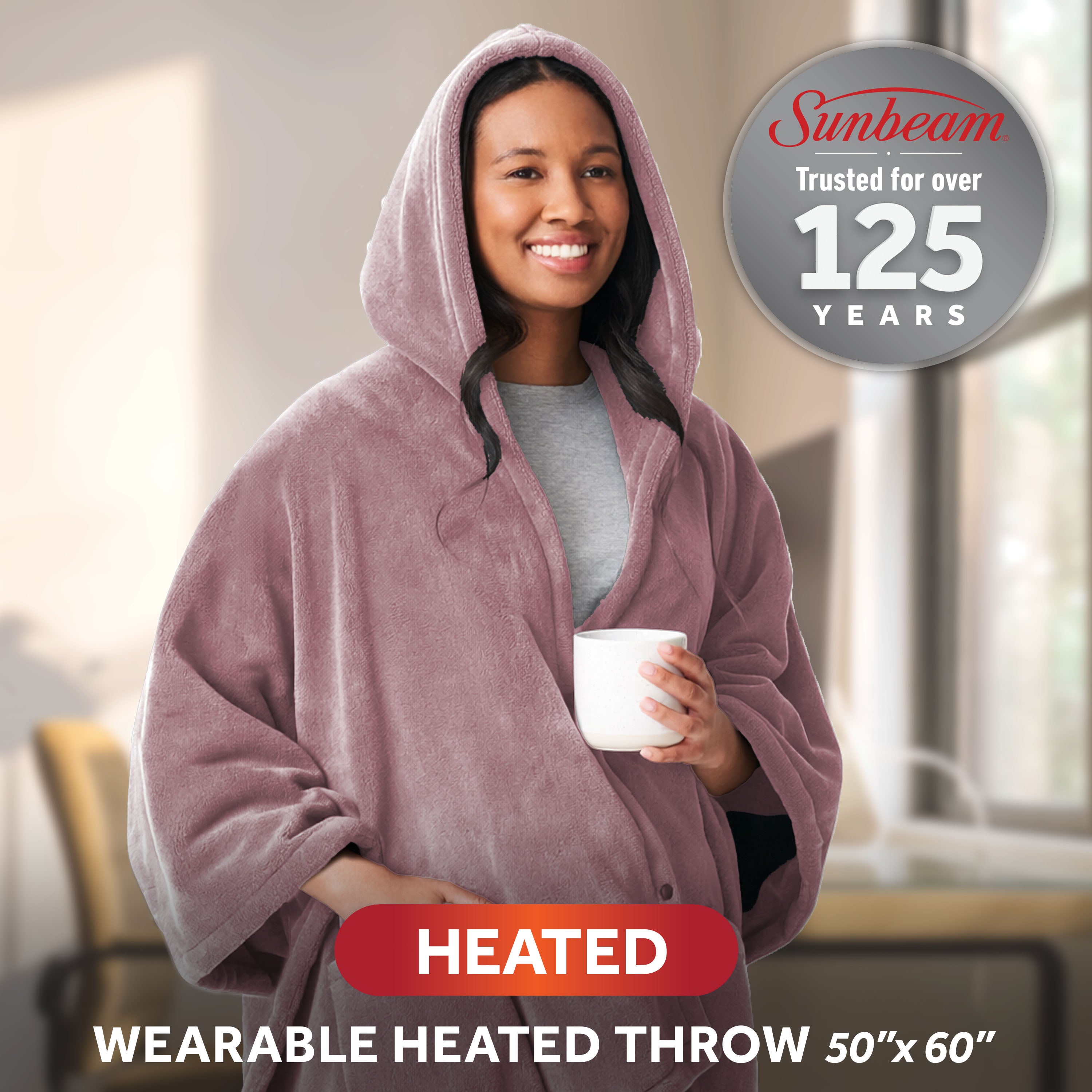 Sunbeam manufacturer image associated with exact wearable heated throw SKU 14790, depicting a purple hooded wrap with sleeves