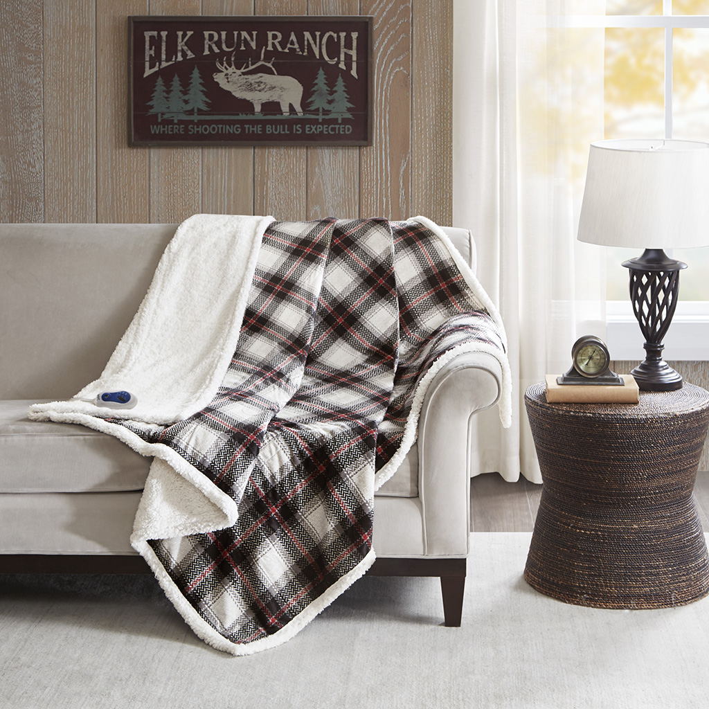 Woolrich Ridley WR54-2388 60 by 70 inch black/red plaid heated throw, ivory Berber reverse and one wired controller.
