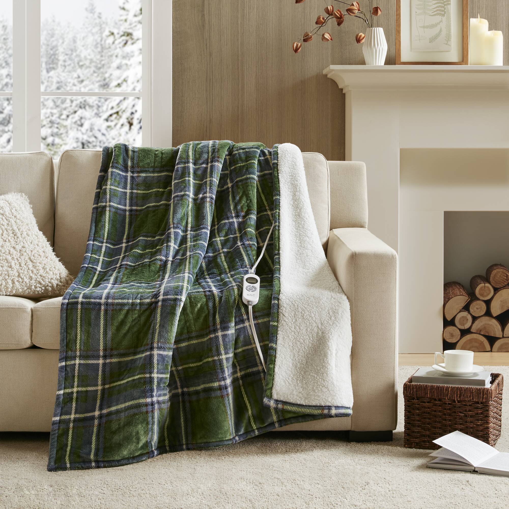 Woolrich WR54-3254 Green Plaid throw with green and navy plaid face, ivory sherpa edge and one wired controller visible