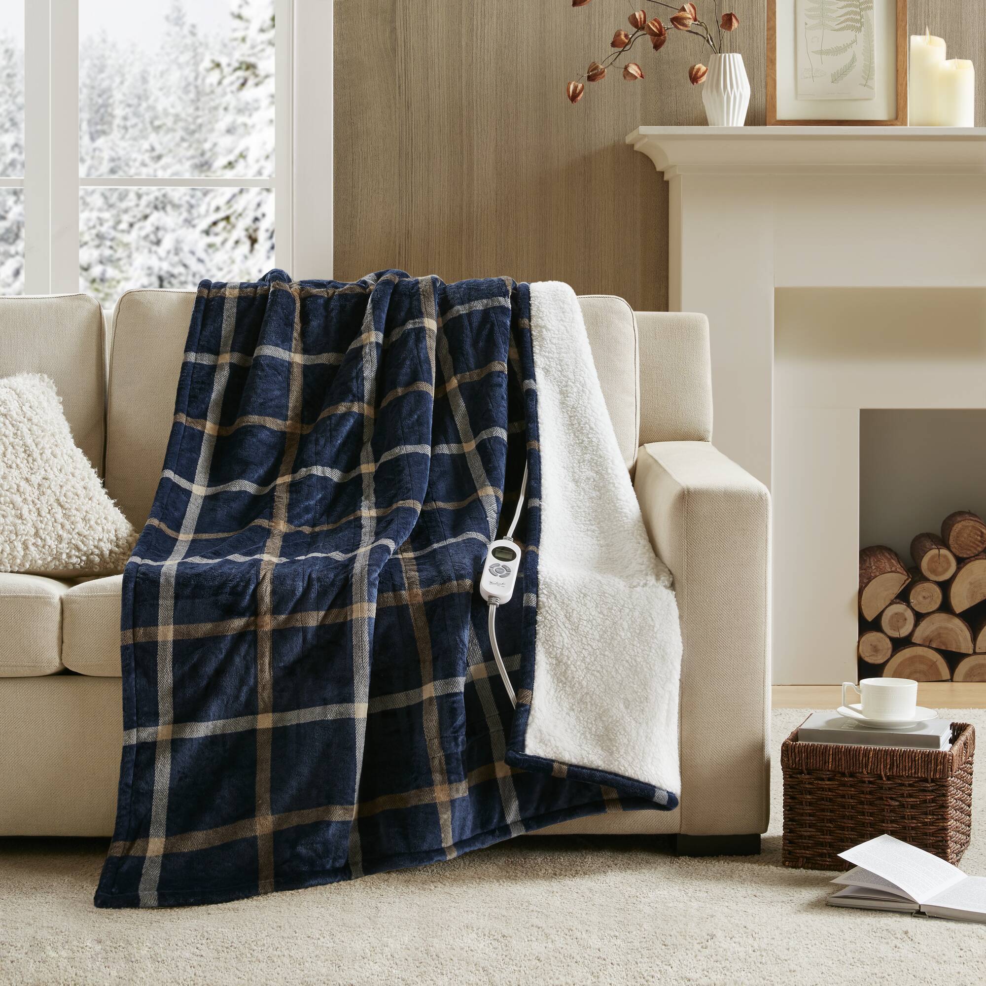 Woolrich WR54-3255 Navy Plaid throw with navy plaid face, ivory sherpa edge and one wired controller visible