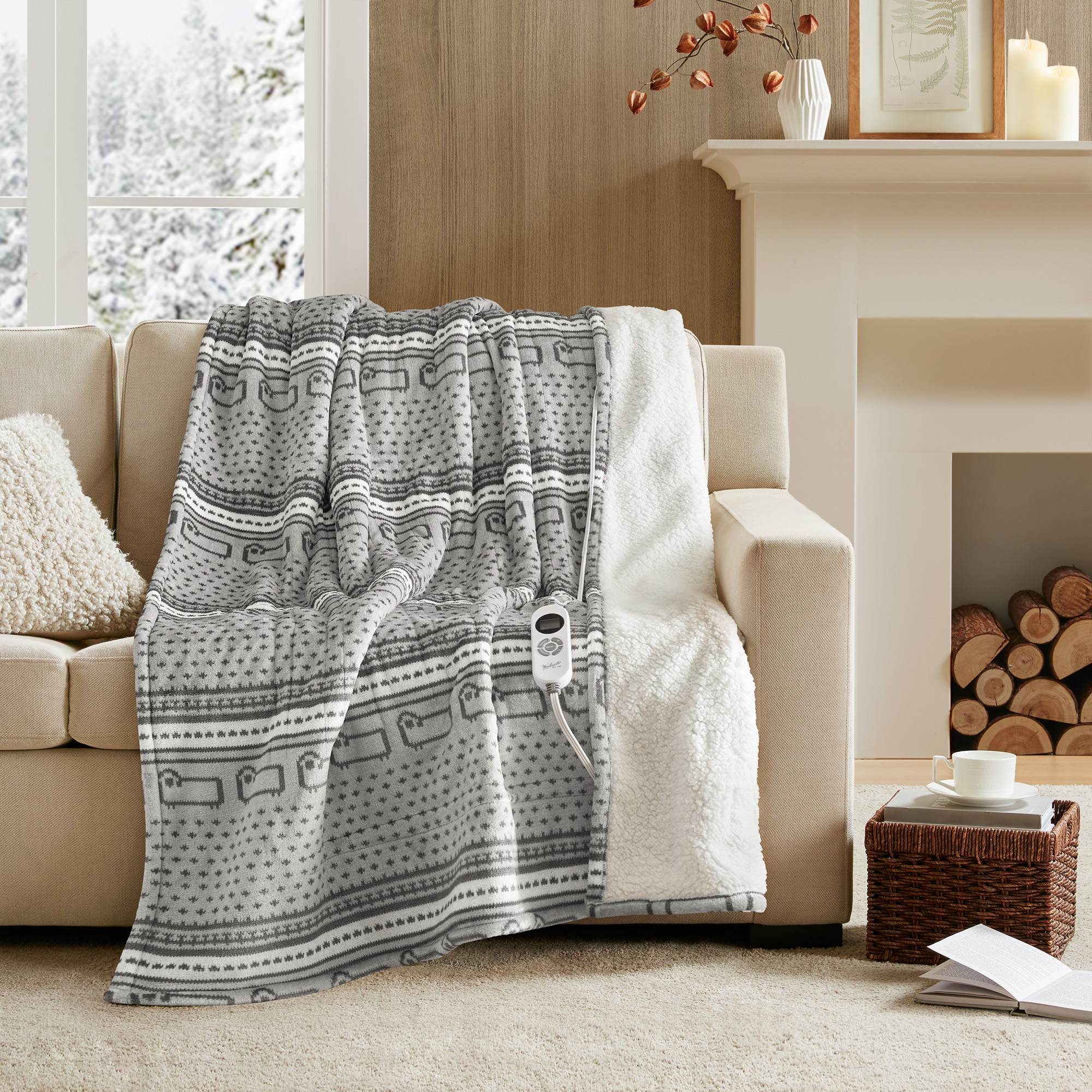 Woolrich WR54-4137 Grey Cozy Sheep throw with gray and white repeating pattern, ivory sherpa edge and one wired controller visible