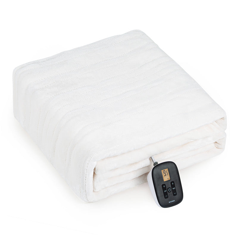 White WOOMER Twin electric blanket folded with one wired control visible